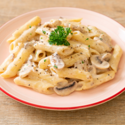 Pasta (Penne & Farfelle in creamy cheese sauce or arebita sauce) (250 GMS)